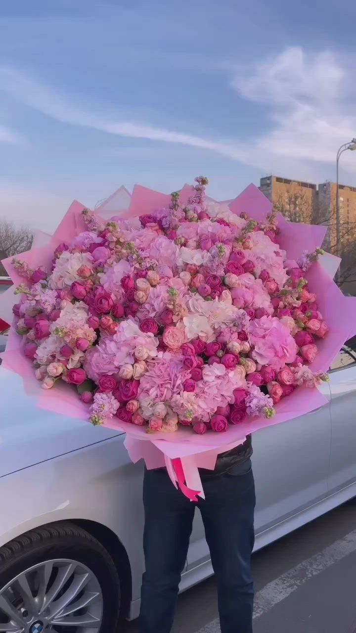 Professional floral arrangement in modern corporate setting